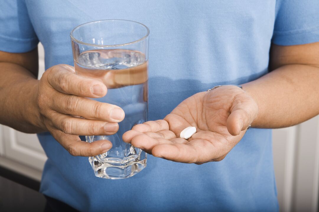 a man taking anti-parasitic drugs